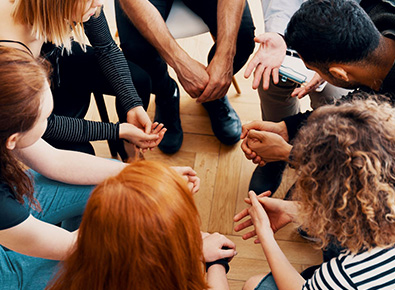 Circle of people at support group